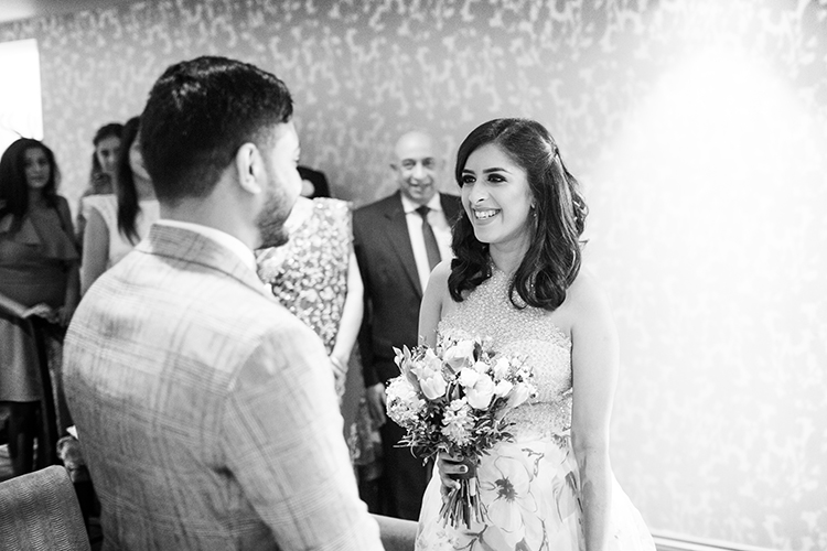 Bride smiling at Groom in the ceremony