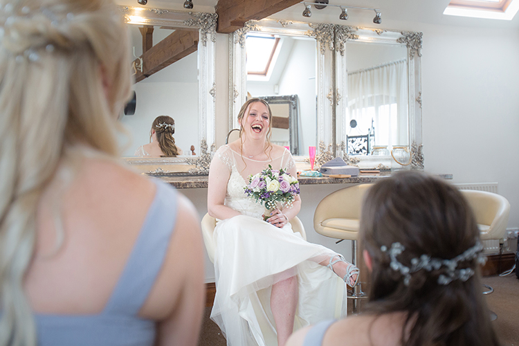 The bride laughing