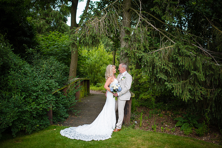 Bride and Groom in Nuthurst Grange's gardens