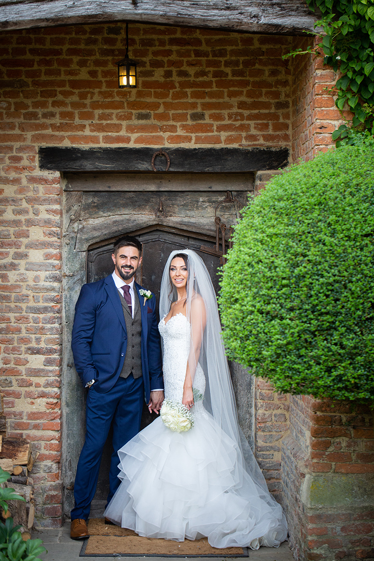 Bride and Groom in doorway.